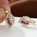 Leaf earrings in champagne gold finish with purple zircon stones and micro-pave setting - Champagne Gold Purple Stone