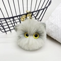 Grey plush cat keychain with yellow eyes and gold metal clip on white background - Individual Packaging / Gray Cat