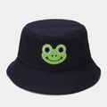 Close-up of navy blue bucket hat featuring a green frog embroidery on cotton fabric - M (56-58cm) / Navy Blue