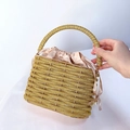 Elegant gold beaded evening bucket bag with woven texture and pearl charm detail - Gold