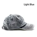 Berretto da baseball in denim lavato azzurro con dettagli consumati e fibbia in metallo - Azzurro