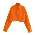 Detailed front view of an orange cropped long-sleeve shirt with utility pocket design - Orange Red / S