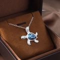 Silver turtle necklace with deep blue opal shell displayed in a premium jewelry gift box - Large Blue Sea Turtle