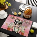 Detail of pink Christmas placemat with nutcracker soldier and hello WINTER text decoration - CD57-10