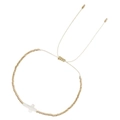 Bohemian gold beaded bracelet with a white cross charm and adjustable cord closure - Cross Pendant Gold Beads Style (MI-B220189A)