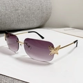 Frameless square sunglasses with purple gradient lenses and gold butterfly accents - Gradient Grey