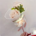Detail of a handmade champagne pink faux rose pen with pearls and warm LED lights - LED Skirt Twin Roses / Pink