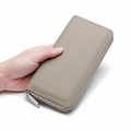 Genuine leather long zip-around wallet in taupe with lychee pattern held by hand - 20x2.5x10cm / Simple Grey