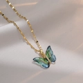 Collar de mariposa dorado con alas en degradado azul-verde y detalles de circonita brillante - Collar de Colibrí con Cadena / Oro Verde