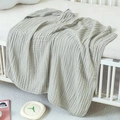 Detailed texture of soft light green 6-layer cotton muslin baby hooded towel and blanket - Gray