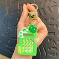 Green frog calculator keychain with rainbow charm and lucky charms for bags - Animal Trendy Computer - Peace Frog