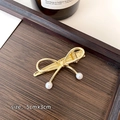 Elegant golden bow hair clip with pearls and minimalist metal finish, size 5x3cm - Lead Grey