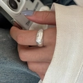 S925 sterling silver ring with irregular hammered texture on model's index finger - JZ1326 (Irregular Texture)
