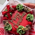 Red Christmas cake with Merry Christmas gold topper and festive cream decorations - Merry Christmas Gold Script / Large
