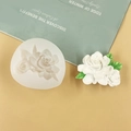 White flower-shaped silicone cake mold and finished floral soap on a minimalist desk - 3521 Gardenia / Clear