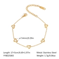 Golden stainless steel heart charm bracelet with 17+5cm adjustable chain and hollow hearts - Hollow Heart Anklet (YYB025065)