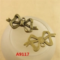 Vintage bronze zinc alloy bow pendant charm for DIY jewelry making, model A9117 - A9117-31*15MM