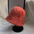 Fuzzy faux fur bucket hat for women in warm coral pink with soft plush texture - Adjustable / Caramel color