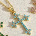 Gold-plated cross necklace with turquoise beads and white cubic zirconia accents - Turquoise Blue Zirconia