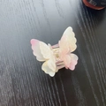 Detail of double-layer butterfly hair claw clip with pink gradient and glitter finish - Iridescent Pink White