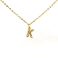 Golden necklace with a crystal-encrusted letter K pendant on a delicate chain - Gold Letter K