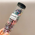 Jar of colorful elastic hair ties for kids featuring pink, blue, and yellow mini bands - Mixed Nylon Small (9#) / 300-Piece Set (With Jar)