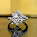 Elegante anillo en S de plata con dos grandes diamantes redondos de talla brillante - US 7 / Oro blanco