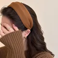 Chic coffee brown wide headband with soft fabric texture shown on a female model - Coffee