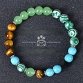Detail view of tiger eye and malachite beads on the wealth and success bracelet - Tiger Eye/Turquoise/Patterned Beads (Money Success-6)