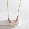 Dettaglio della collana dorata con perle multicolore e ciondolo a sole boho - Perline Colorate