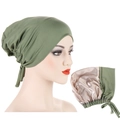 Dettaglio del turbante verde militare con fodera in raso oro chiaro per la protezione - Verde Erba