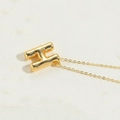 Polished 14K gold plated initial H pendant necklace with a minimalist cross chain - Letter H