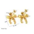 Golden bow-shaped stud earrings with textured finish and top bead detail - Textured Large Bow Knot Stud Earrings (YYE023497)