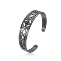 Close-up of black stainless steel cuff bracelet featuring cutout Celtic knot patterns - Black