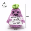 Macro shot of 8cm crochet eggplant plush with 14g weight and positive encouragement card - Eggplant
