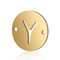 Macro shot of gold stainless steel circular pendant with cutout letter Y and dual holes - Letter Y