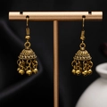 Macro shot of vintage golden bell earrings featuring intricate floral carving and tiny metal beads - H4413-1 Antique Gold