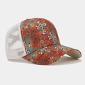 Detail of western print trucker hat featuring turquoise sunflower and cross patterns - Style 7-Western Folk Print