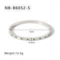 Detail view of silver stainless steel grid bracelet with green zircon stones, 6cm diameter - Green Zirconia Silver Style (NB-B6052-S)