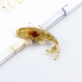Handcrafted resin koi fish figurine with gold foil and red crystal stone interior - Agate