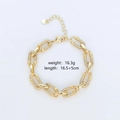 Detalle de pulsera de eslabones dorados con incrustaciones de circón y dije de corazón - 16.5+5CM / Dorado