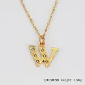 Collier avec pendentif lettre W en acier inoxydable plaqué or 18K et cristaux brillants - Lettre W
