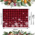Detalle del mantel individual navideño a cuadros rojos y negros con copos de nieve - Cuadros rojos y negros con copos de nieve