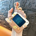 Adorable cartoon Capybara keychain featuring a unique rotating face design for bags and car keys - Drawing Board - Coffee Cup
