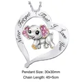 Detail view of heart-shaped elephant pendant with engraved message and pink stones - Heart Elephant
