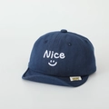 Dettaglio cappello neonato blu navy con ricamo Nice bianco e etichetta del marchio - 50cm 1-3 Anni / Blu