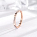 Minimalist 18k rose gold titanium ring featuring white shell inlay and a center diamond - US 4 / Rose Gold