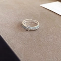 Detailed macro view of silver star ring featuring blue enamel and sparkling zircon pave - Double Layer Star Style (2# Ring-Silver-Blue)