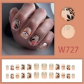 Press-on nail set featuring black leaves, heart evil eyes, and silver glitter patterns - Leopard Heart Eyes Style (W727) / 24 Pcs/Box (With Glue)