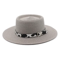 Detailed close-up of grey woven straw boater hat with cow print ribbon and metal buckle - M (56-58cm) / Gray